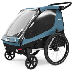 THULE Rimorchio Per Bicicletta Courier Aegean Blue -Negozio online Pink Or Blue thule rimorchio per bicicletta courier aegean blue a338355 1