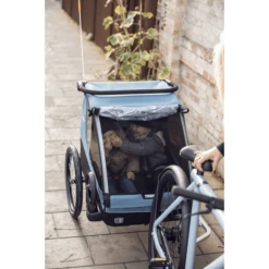 THULE Rimorchio Per Bicicletta Courier Aegean Blue -Negozio online Pink Or Blue thule rimorchio per bicicletta courier aegean blue a338355 3